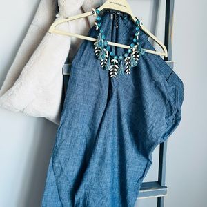 Used denim dress pants.